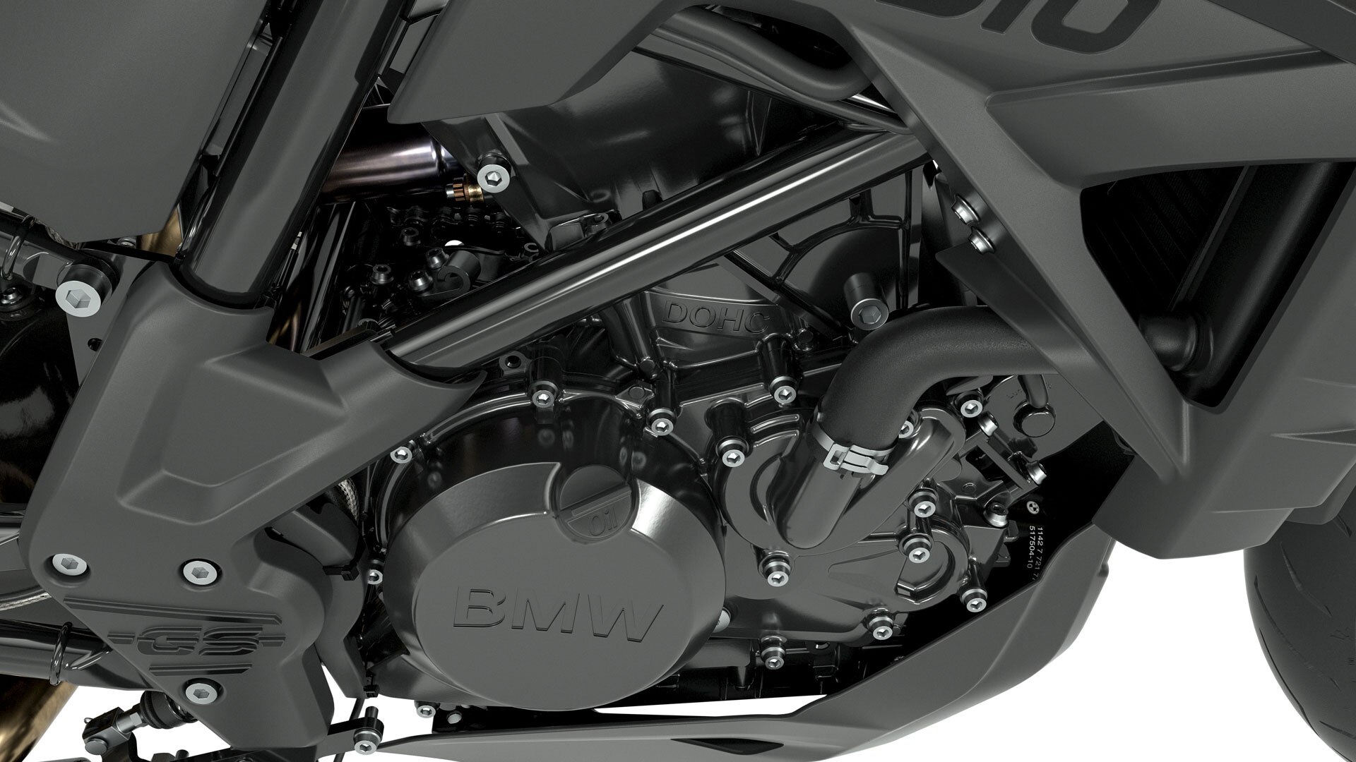 Vemos el bloque del motor completamente negro con letras G 310.